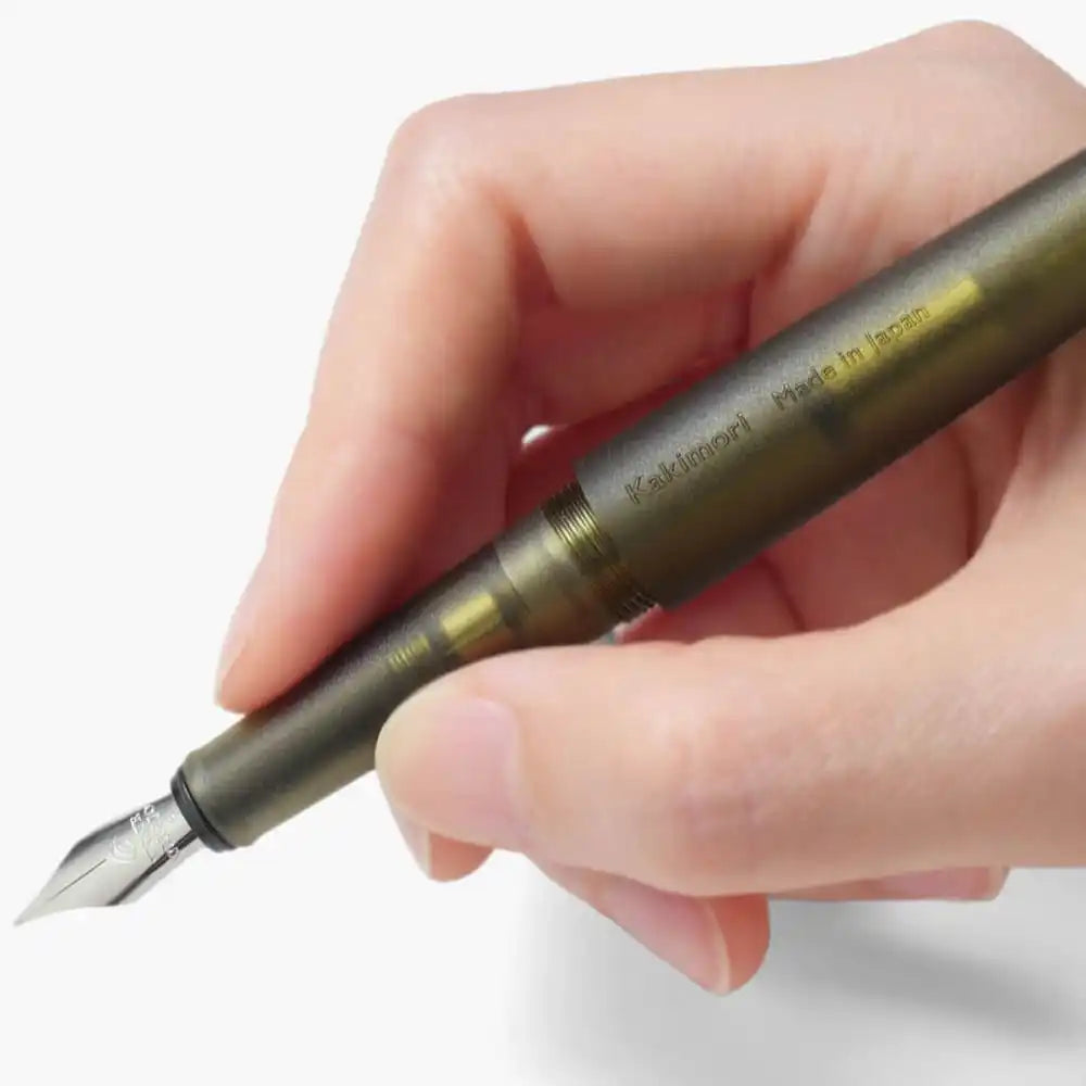 Olive-green fountain pen.