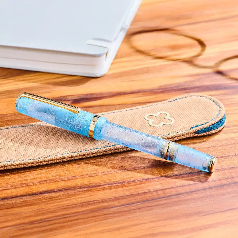 Sparkly blue fountain pen.